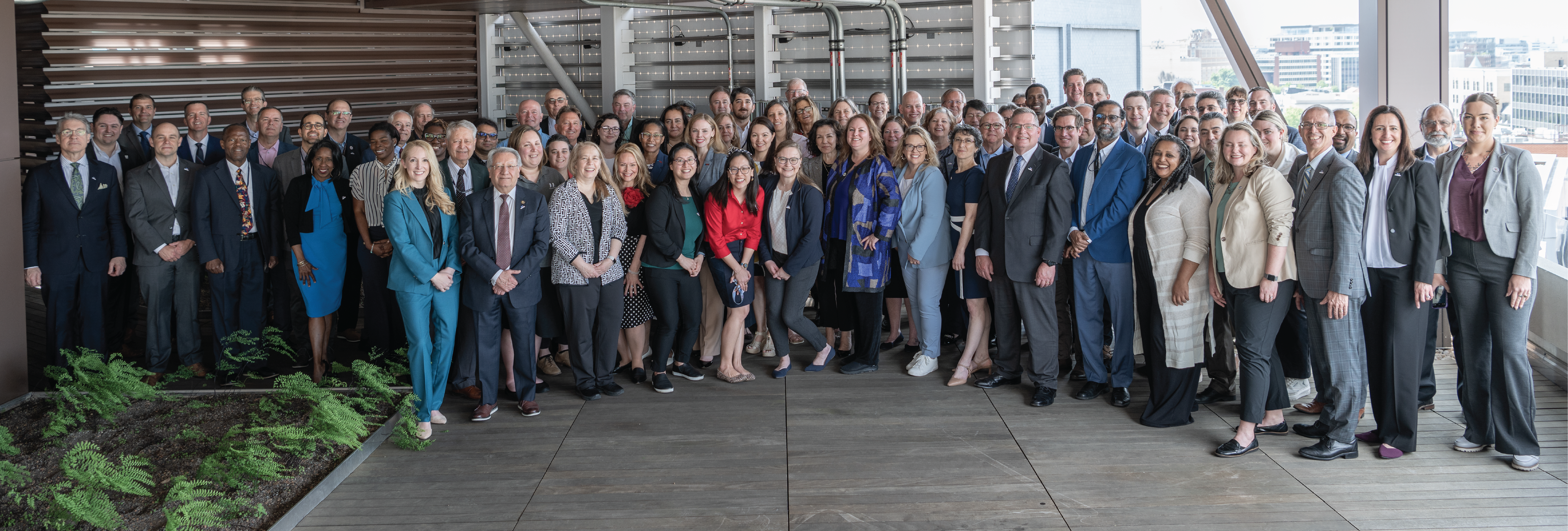 Group photo of the 2024 Manufacturing USA Network Meeting on the rooftop of the American Geophysical Union building in Washington, D.C.