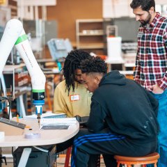 Students receiving ARM's certified robot training