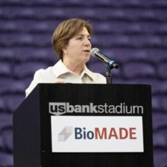 Photo of BioMADE VP and COO, Jill Zullo standing at a podium