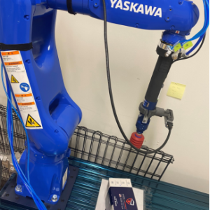 Blue robotic arm built by Yaskawa.