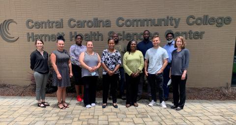 BioWork trainees, with Terra Trujillo (far left) and Lisa Smelser (far right). Credit: Central Carolina Community College.  Photo Credit: Elizabeth Ellis, NCBiotech Center