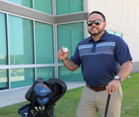 Photo of Nate Acevedo golfing
