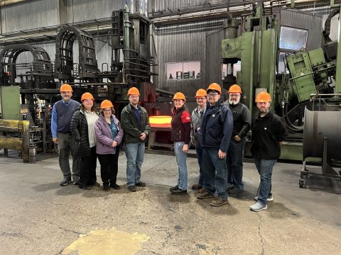 Photo of a group of casting and forging professionals at a foundry.