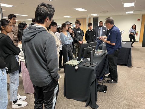 High school students watching a demonstration at NextFlex on Manufacturing Day